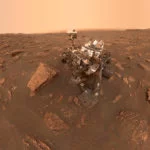 Mars Curiosity Rover on Martian Terrain